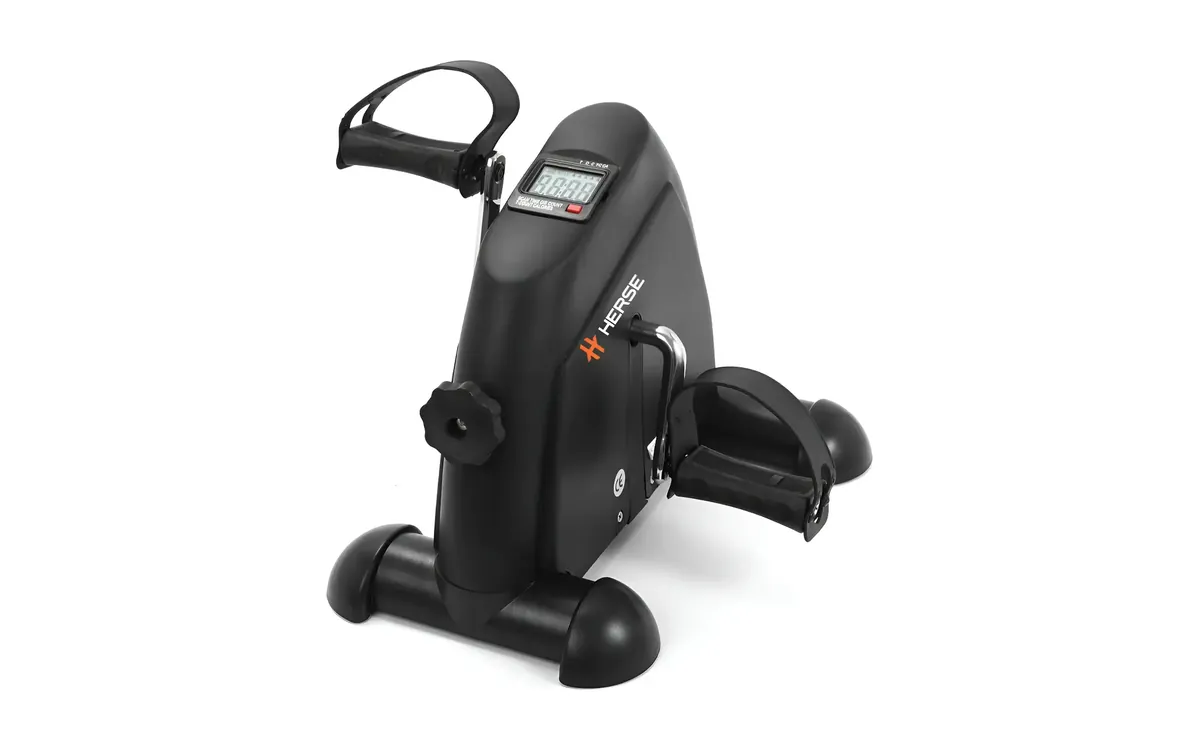 Mini pedal exerciser for seated use